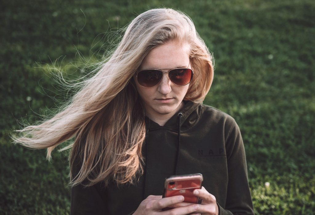 woman checking her cellphone