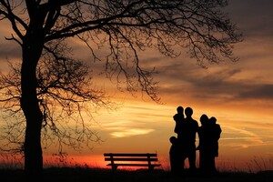 family in shadown by sunset