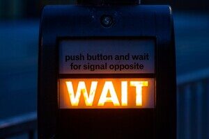 light with the word wait